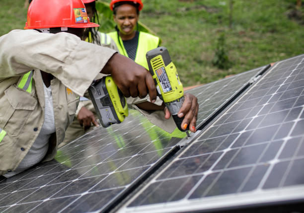 FineKraft technicians installing a solar panel